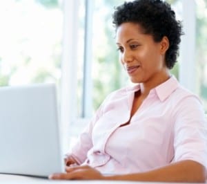 Attractive woman working on laptop